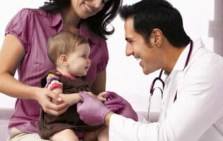 Baby and a parent at the doctor's office