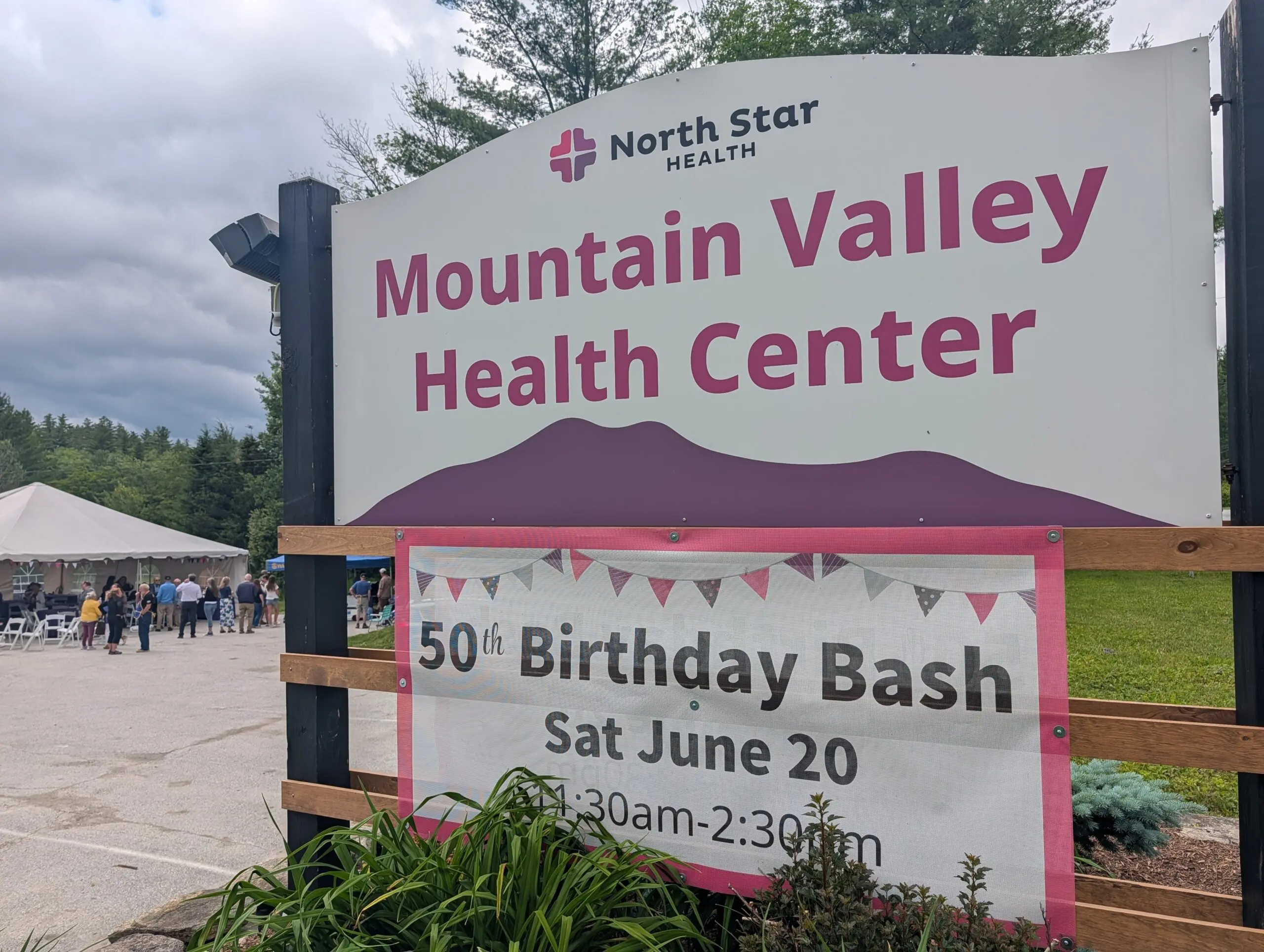 Mountain Valley Health Center sign with 50th Birthday Bash banner below